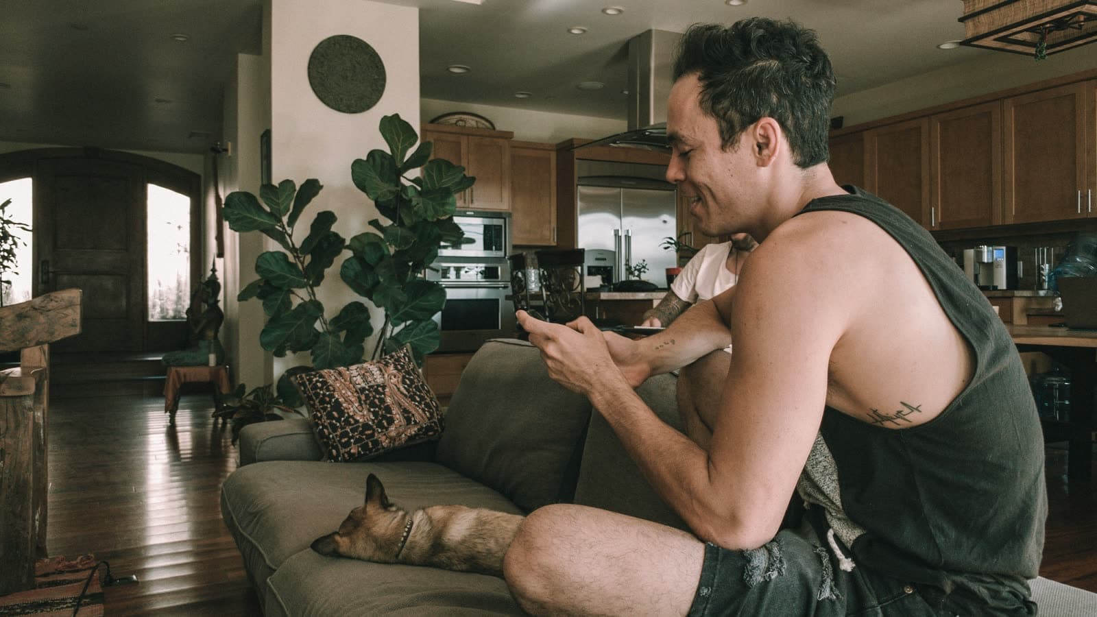 Man relaxing at home on the sofa